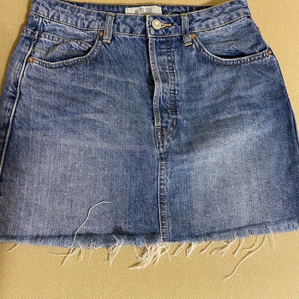 Free People denim cutoff mini skirt. Size 28. Used condition.